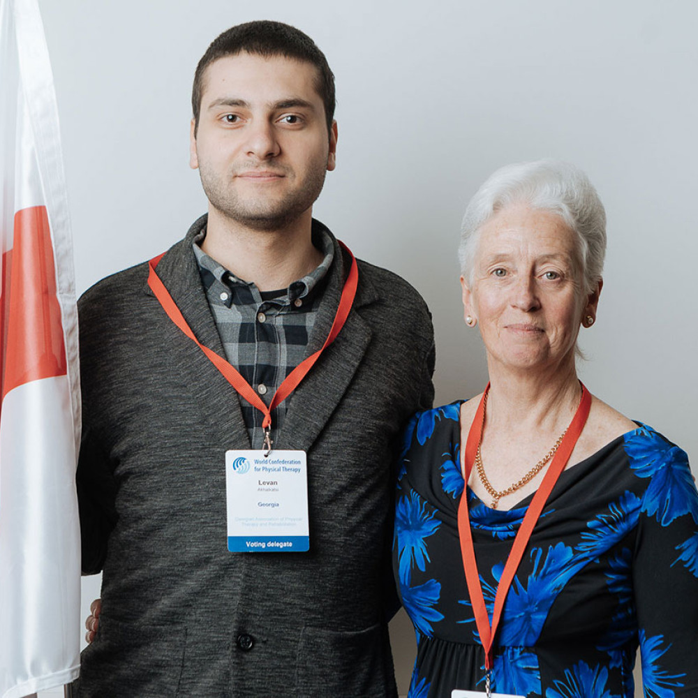 A man and a woman stand next to each other