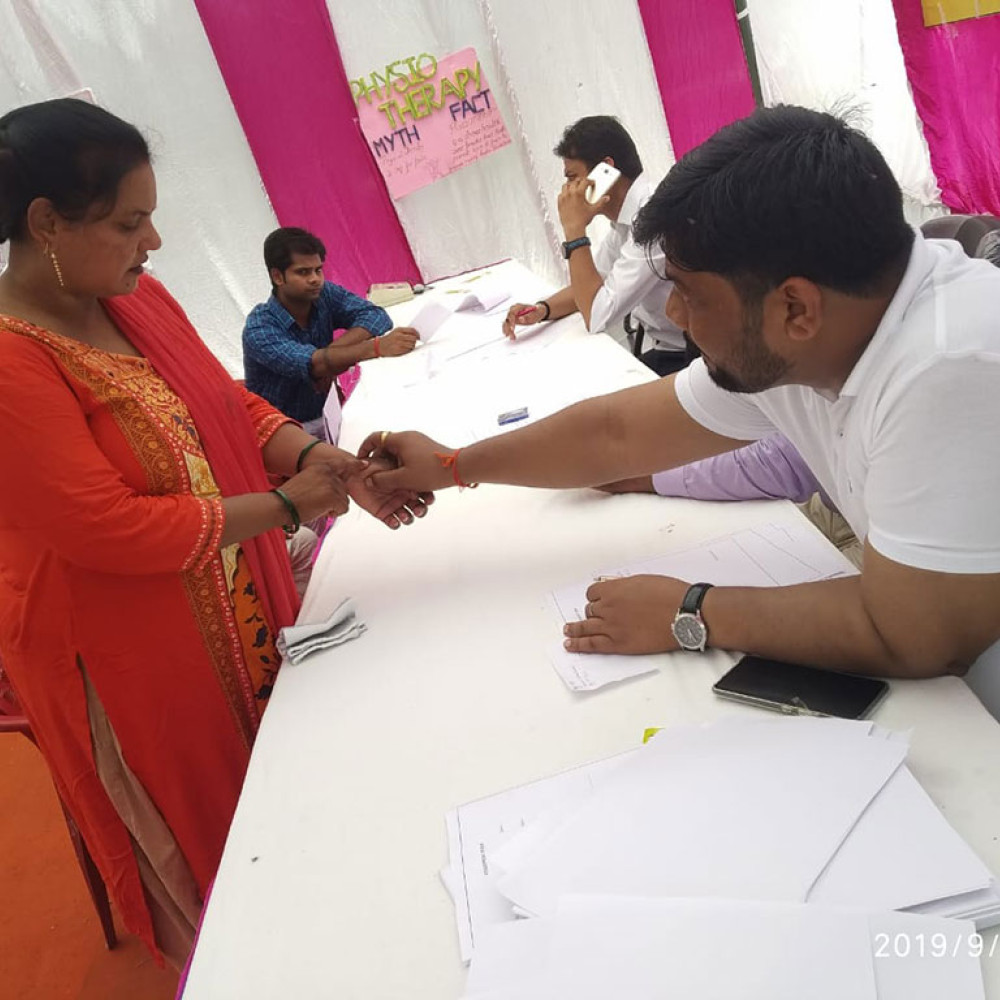 Photograph showing a celebration held in India to mark World PT Day 2019