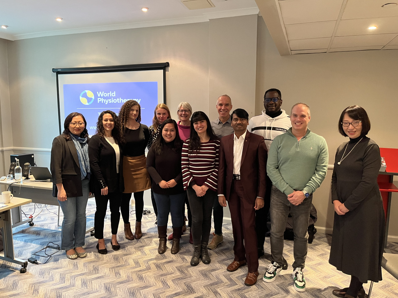 Members of the CPC with World Physiotherapy staff Lucy Ridley and Birgit Mueller-Winkler